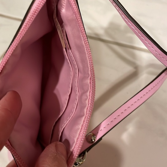 Like new pink patent coach wristlet - super cute, great quality bag. - Picture 4 of 4
